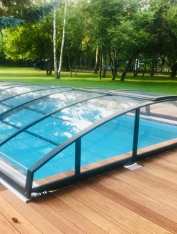 Swimming pool roofing