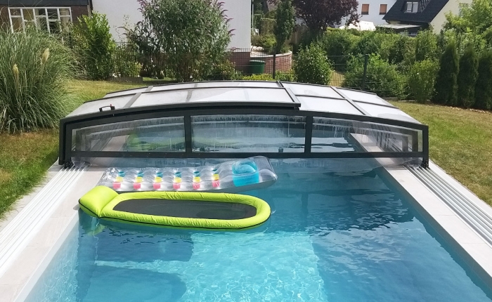 Swimming pool roofing